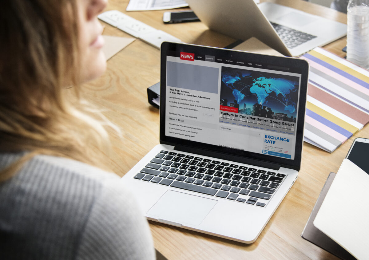 Laptop displaying CMS News website