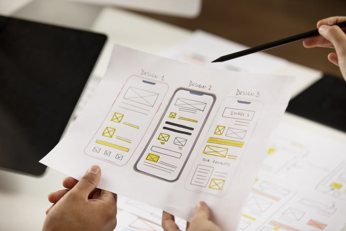 Why you need an app development agency – team collaborating on project planning